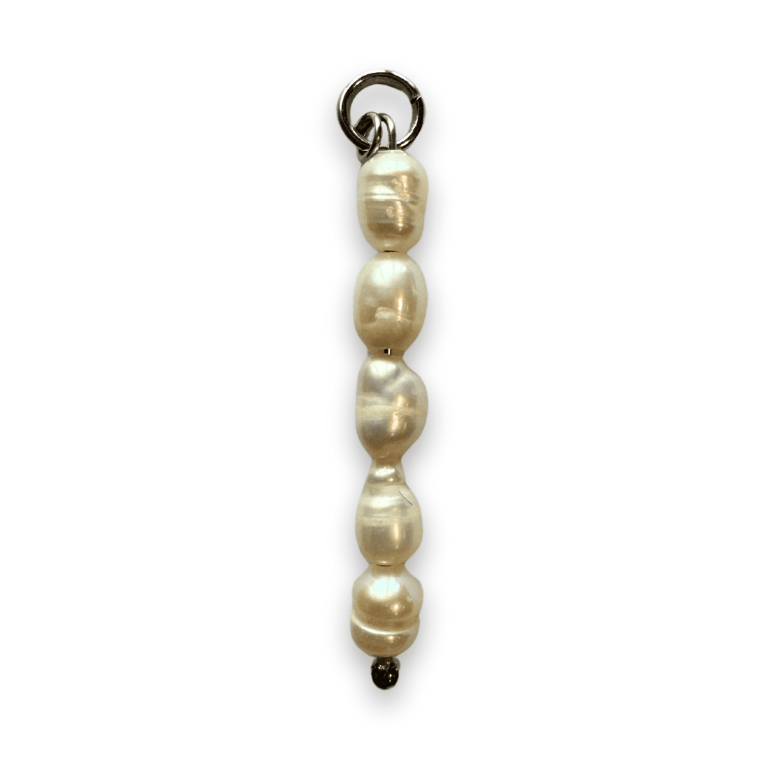 Five oval pearls